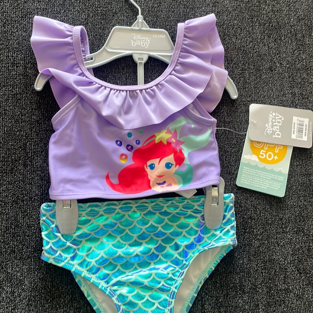 Baby girl Ariel mermaid swim
